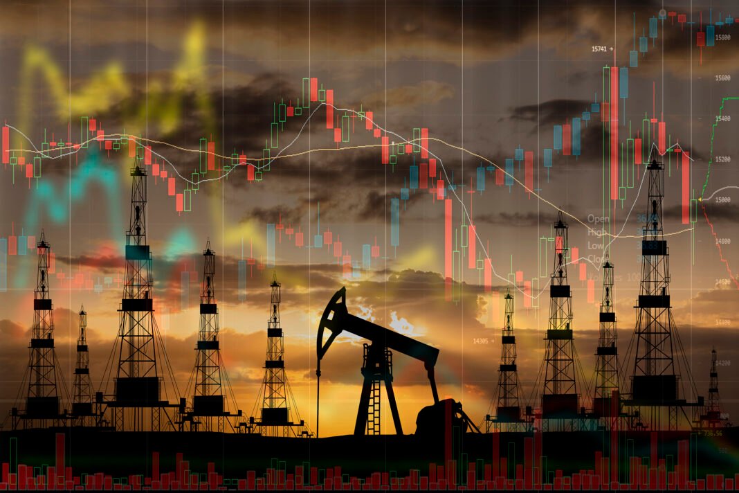 Oil pump on the background of stock charts. World Oil Industry